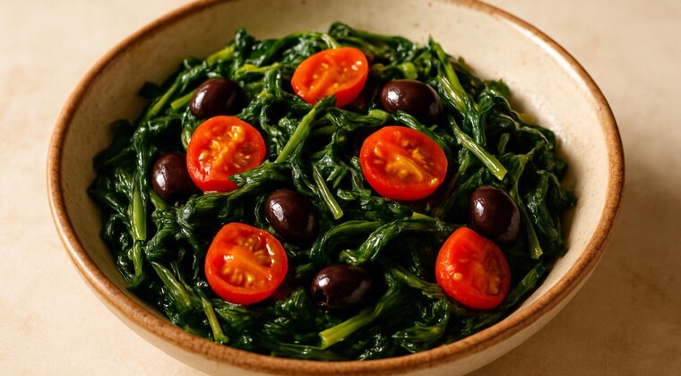 Cicoria ripassata con pomodorini e olive nere