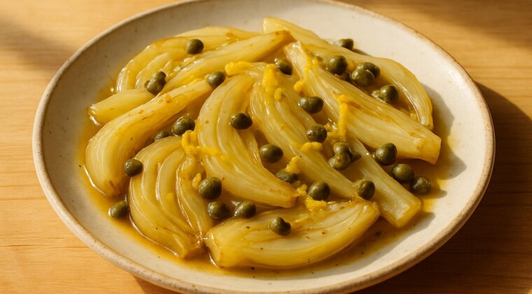 Finocchi stufati con capperi e scorza di limone