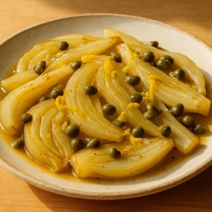 Finocchi stufati con capperi e scorza di limone